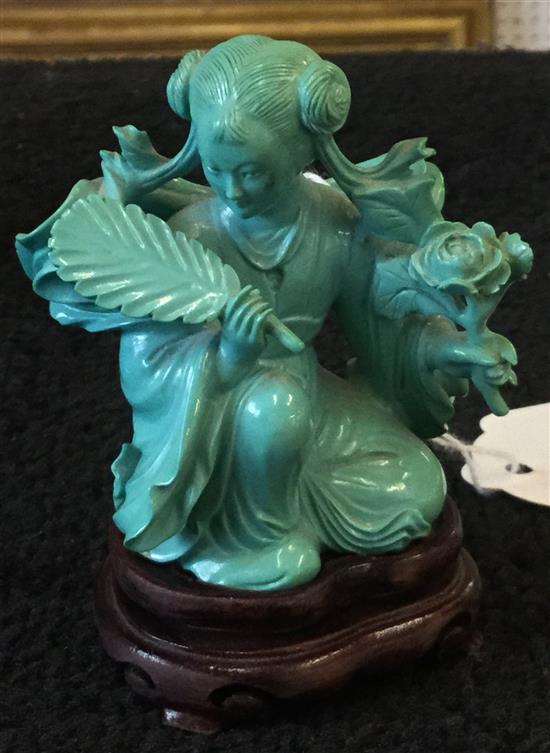 Carved turquoise figure of a geisha, hardwood stand